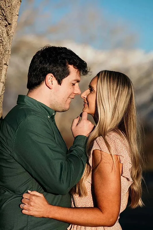 Future husband biting his lips at engagement photoshoot