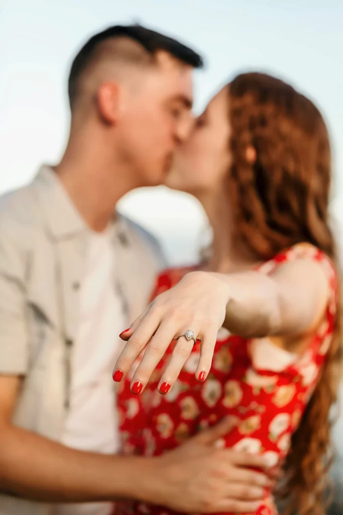 Kiss at engagement photo session