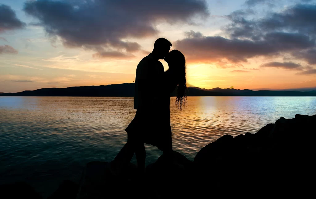 Silhouettes on Salt Lake City lake backdrop