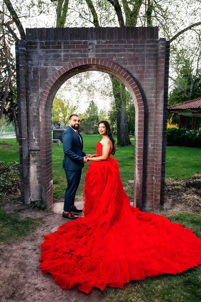 Couple posing in International Peace Gardens