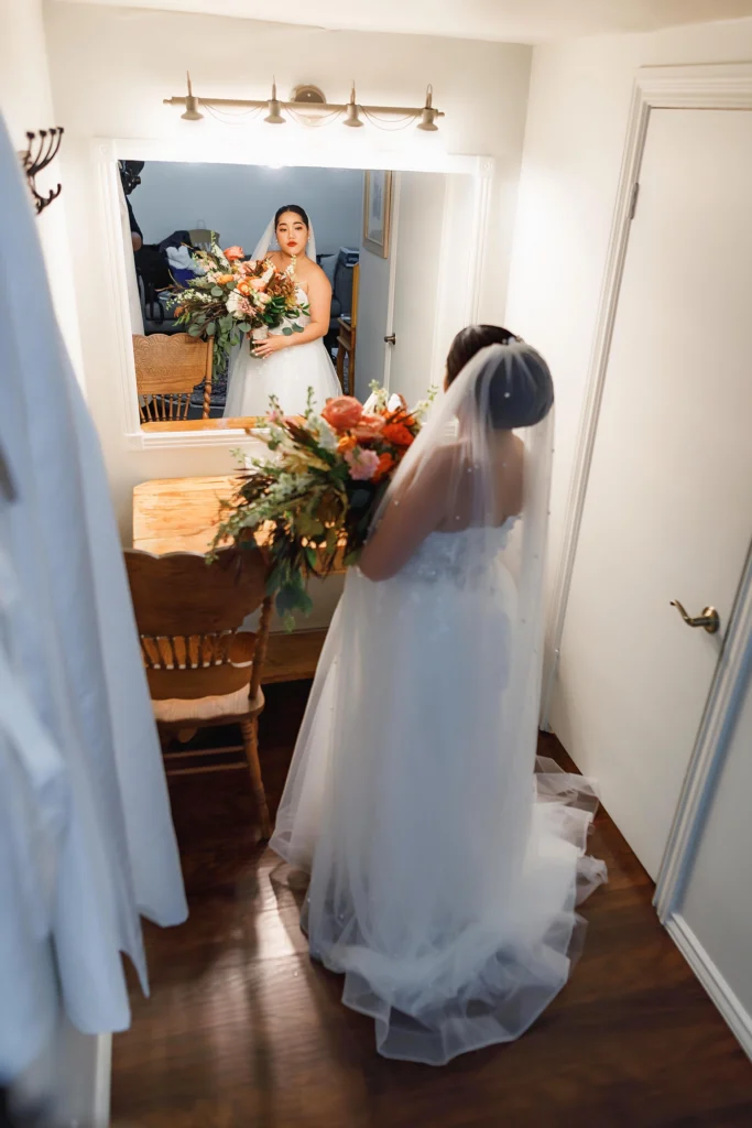 Bride in a front of mirror - wedding photo