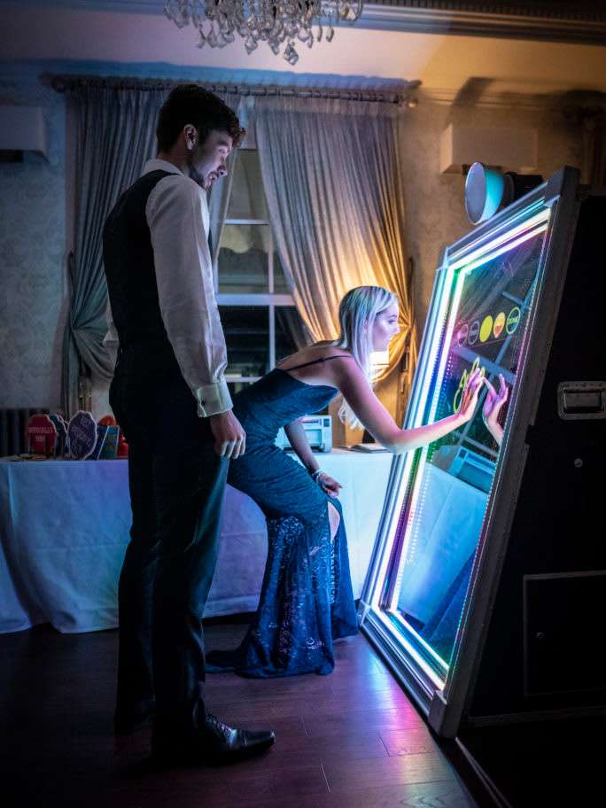 Couple near Katinov Photo booth